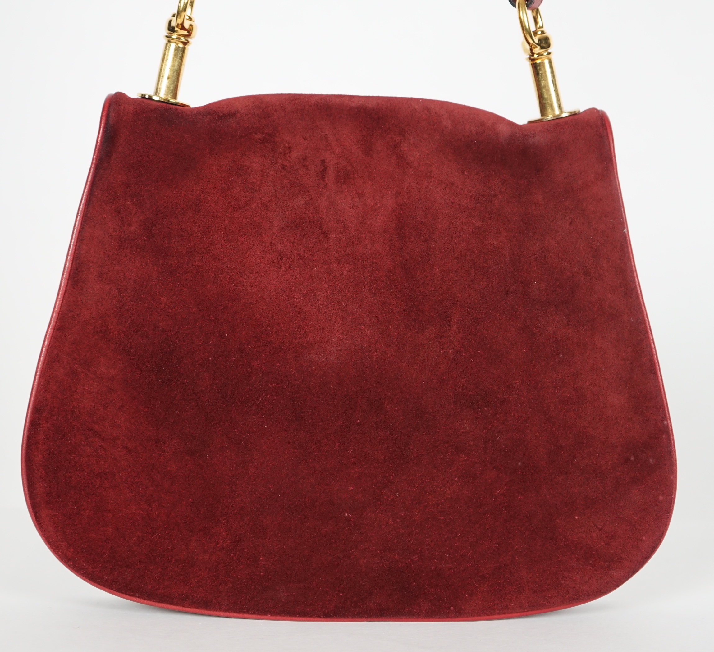 A vintage Gucci Blondie claret suede shoulder bag, width 29.5cm, max height 25cm, overall height 63cm to top buckle hole